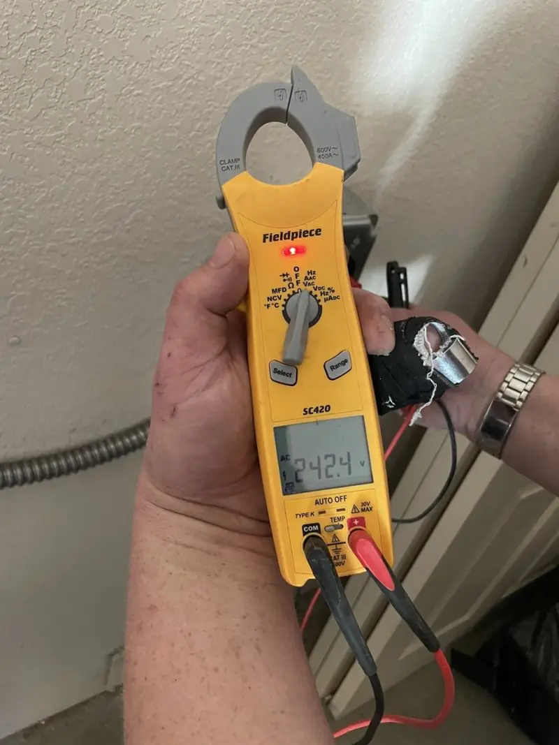Voltage testing with clamp meter during Electrical Installation Services in Claremont